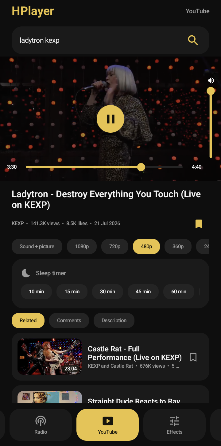 A YouTube video playing inside HPlayer, with play controls over the picture, a volume slider up the right edge, quality options and related videos below.